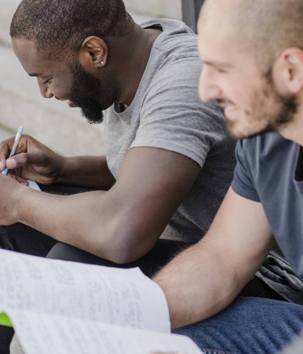 cheerful-men-with-documents